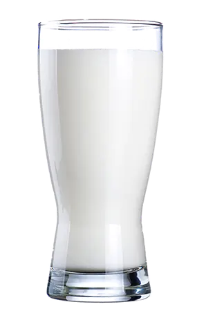 Vaso de leche hecho con leche en polvo Laqtia
